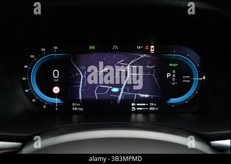 Virtual Cockpit, Digital Dashboard Displaying Map and Information About a Vehicle in Front of the Steering Wheel Including a Speedometer, Dials, Navig Stock Photo