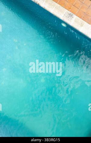 top-down aerial view of a rectangular swimming pool, aerial drone view. Concept of summer relax Stock Photo