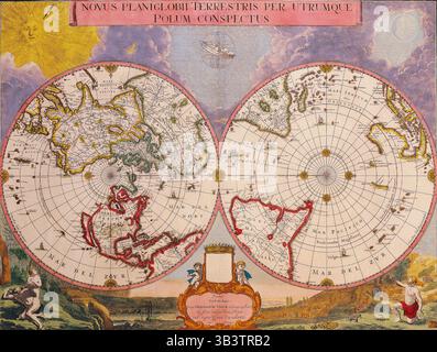 SEATTLE -SEP 26, 2024 - Antique double hemisphere world map centered on the north and south poles, featuring illustrations of the sun, moon, sailing s Stock Photo
