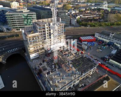 Aerial drone view of Host Student Housing Ltd new student accommodation under construction in Temple Meads, Bristol, UK, April 2025 Stock Photo