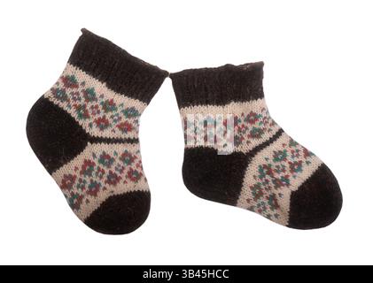 Warm woolen knitted socks isolated on white background Stock Photo