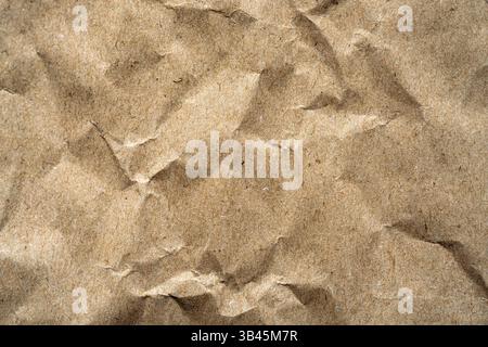 Grunge vintage old paper background. Brown crumpled paper texture. Stock Photo