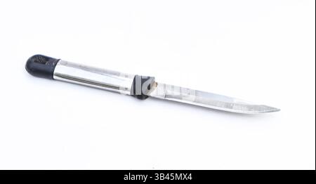 Simple studio shot captures a fixed blade knife with a stainless steel blade and black rubberized handle, horizontally centered on a clean white surfa Stock Photo