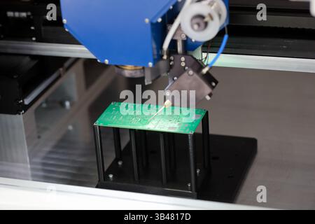 PCB laser selective soldering system close up. Selective focus. Stock Photo