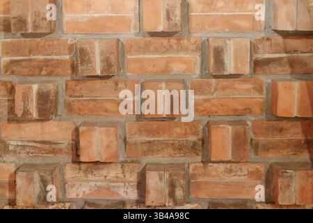 Brick wall arrangement background with geometric and embossed compositions. Stock Photo