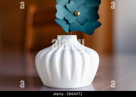 Small white single flower vase 3d printed from corn starch pla filament, ideal for dried or artificial flowers Stock Photo