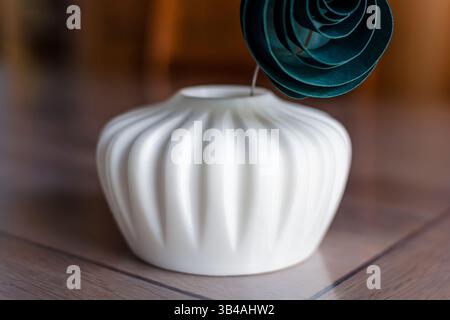 Small white single flower vase 3d printed from corn starch pla filament, ideal for dried or artificial flowers Stock Photo
