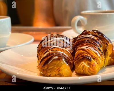 Two minicroissants with chocolate. Close view. Stock Photo