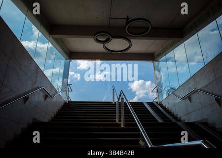 Exit from underground passage, stairs up, railing, ramp. Sosnowiec, Poland. Stock Photo