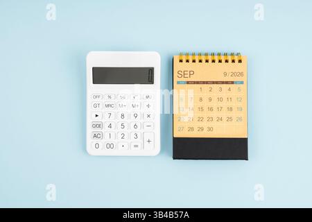 September 2026 calendar and calculator on yellow background Stock Photo ...