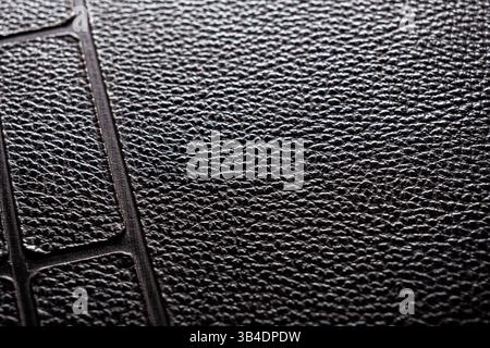 Close-up of the black rough leather surface Stock Photo