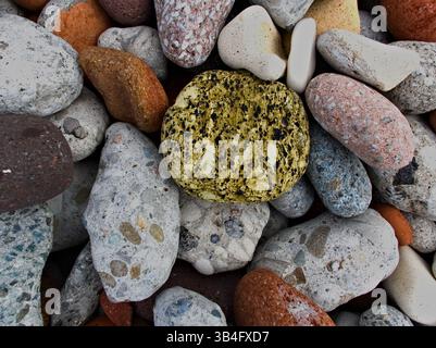 Each pebble has been shaped by years of lake movement. Ontario created a natural canvas from construction remains. Stock Photo