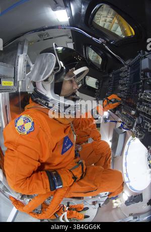 Oct. 24, 2014 - Johnson Space Centre, Texas - USA Johnson Space Centre -- 24 Aug 2014 -- File image dated 24 Aug 2014 of NASA Spacesuit engineers demonstrate how four crew members would be arranged for launch inside the Orion spacecraft, using a mockup of the vehicle at Johnson Space Center in Texas USA -- Picture by Robert Markowitz/NASA/NASA (Credit Image: © Robert Markowitz//NASA via ZUMA Press) Stock Photo