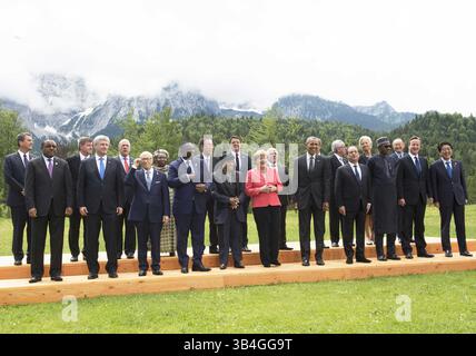 June 8, 2015 - Schloss Elmau, Germany - World leaders stand together during an extended group photo on the second day of the G7 Summit meeting at the Schloss Elmau June 8, 2015 near Garmisch-Partenkirchen, Germany. Included are (L to R): Ethiopian Prime Minister Hailemariam Desalegn, Canadian Prime Minister Stephen Harper, Tunisian President Beji Caid Essebsi, Senegal President Macky Sall, Liberian President Ellen Johnson Sirleaf, German Chancellor Angela Merkel, US President Barack Obama, French President Francois Hollande, Nigerian President Muhammadu Buhari, British Prime Minister David Cam Stock Photo