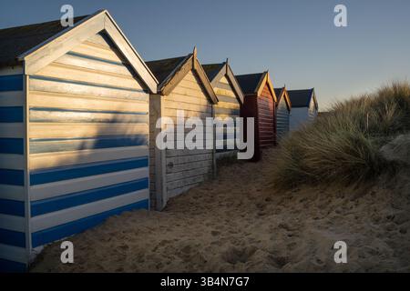 beach huts, in late afternoon winter sun, southwold, suffolk, suffolk, england Stock Photo