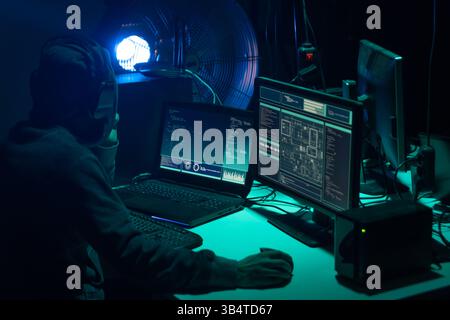 March 12, 2022: Hackers making cryptocurrency fraud using virus software and computer interface. Blockchain cyberattack, ddos and malware concept. Underground background. (Credit Image: © La Nacion via ZUMA Press) Stock Photo