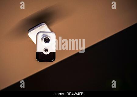 miniature functional surveillance camera in a public place. safety and reliability Stock Photo