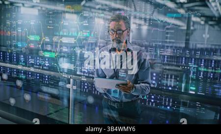 Futuristic Big Data Center with VFX: Specialist Using Tablet Computer. Animated Charts of Cloud Computing and Internet Traffic on Servers. Information Technology, Digitalization Concept. Medium Shot. Stock Photo