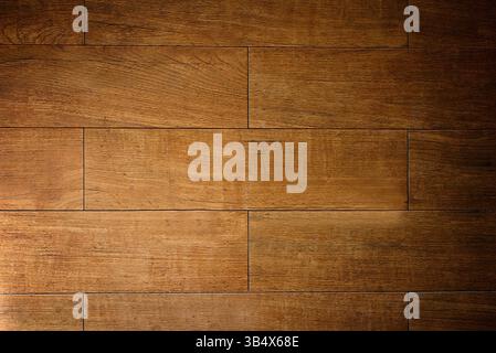 Brown wooden floor tiles creating warm and rustic ambiance Stock Photo