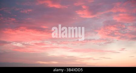 Pink Clouds at Sunset: Sky Beauty. Stock Photo