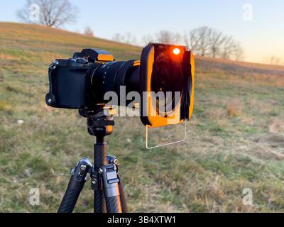 Professional Camera Equipment Set Up in Scenic Outdoor Landscape Stock Photo