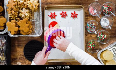 Chocolate Dipped Reindeer Cookies on Baking Sheet Stock Photo
