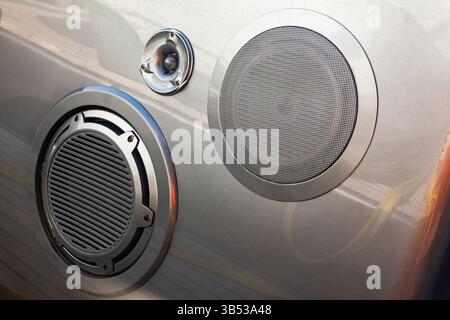 Several different speakers built into the hull of the yacht. Built-in speakers in the vehicle. Stock Photo