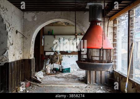 A suspended fireplace inside an abandoned home. This house has since been demolished Stock Photo