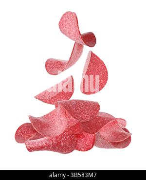 Salami sausage slices falling on white background Stock Photo