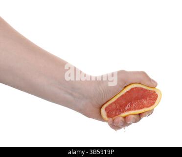 Woman squeezing grapefruit on white background, closeup Stock Photo