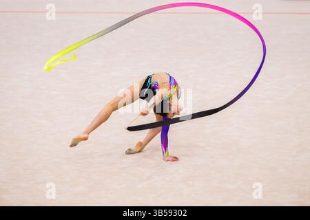May 17, 2022, Gold Coast, Queensland, Australia: New Zealand Senior International Rhythmic Gymnast, Havana Hopman performing ribbon routine during 2022 Oceania Rhythmic Gymnastics Continental Championships. The event was running in parallel with Australian Gymnastics Championships on Gold Coast, Queensland. (Credit Image: © Alexander Bogatyrev/SOPA Images via ZUMA Press Wire) Stock Photo