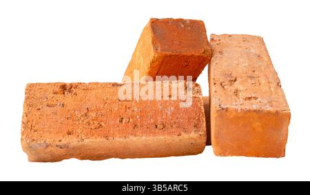 Side view of three old red or orange bricks in stack is isolated on white background with clipping path. Stock Photo