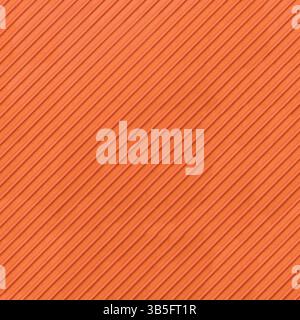 Texture of orange rubber. Seamless orange studded rubber flooring panel for texture or background. Bright Orange Rubber Textured Shoe Tread Surface. Stock Photo
