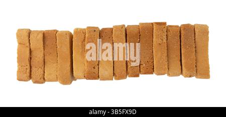 whole wheat mini toasts, toasted slices of bread or rusks isolated on white background with clipping path, top view Stock Photo
