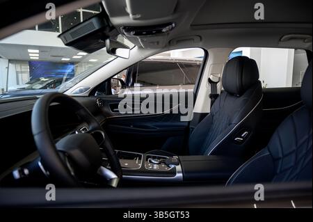 Interior of a modern car with black leather seats. Inside the car. Interior of a prestigious modern car. Comfortable black leather seats Stock Photo