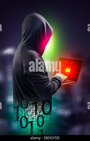Faceless hackers and malware hackers use laptops with dangerous digital code on binary code background. Stock Photo