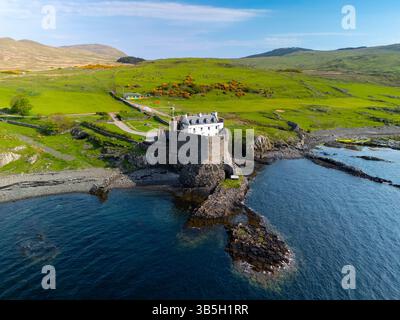 Drone aerial view of luxury hotel with straw roof villas and pools in ...