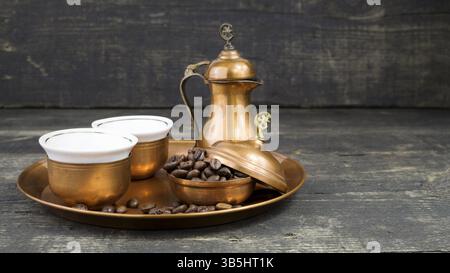 Turkish coffee with traditional copper serving set and coffee beans Stock Photo