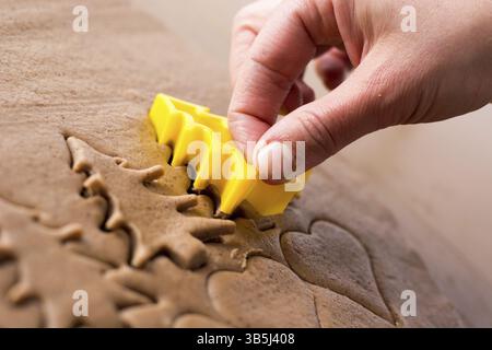 Preparing easter gingerbread cookies. Steps of making pastry Stock Photo
