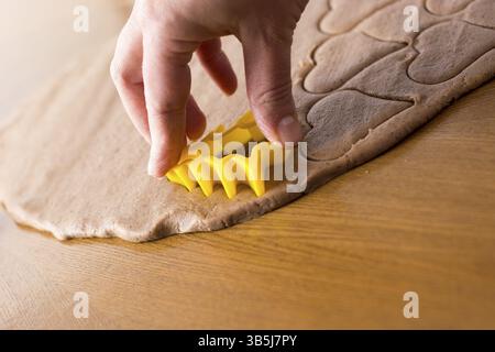 Preparing easter gingerbread cookies. Steps of making pastry Stock Photo