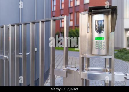 Secure entry gate with digital video intercom Stock Photo