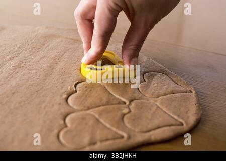 Preparing easter gingerbread cookies. Steps of making pastry Stock Photo
