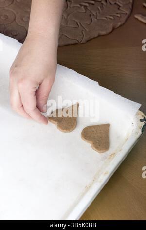 Preparing easter gingerbread cookies. Steps of making pastry Stock Photo