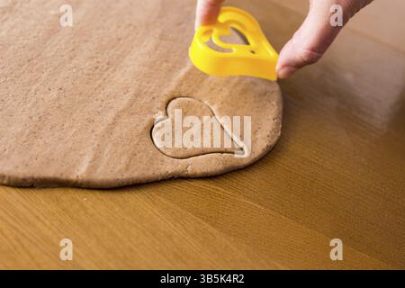 Preparing easter gingerbread cookies. Steps of making pastry Stock Photo