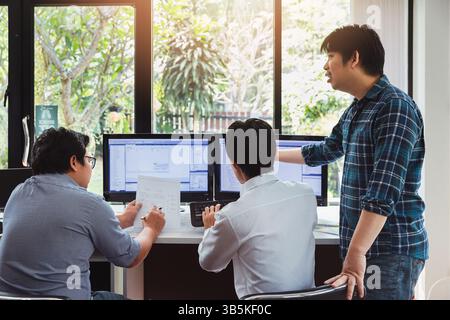 Programmers team working in a software developing. Developing programming and coding technologies. Website design. Cyber space concept. Stock Photo
