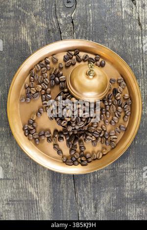Turkish coffee with traditional copper serving set and coffee beans Stock Photo