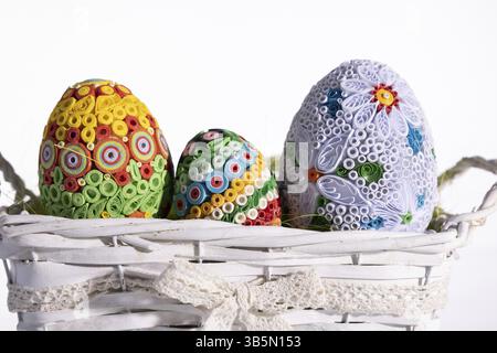 Colorful designs on handmade Easter eggs for the celebration of the Easter world. Christian holidays and its symbols Stock Photo