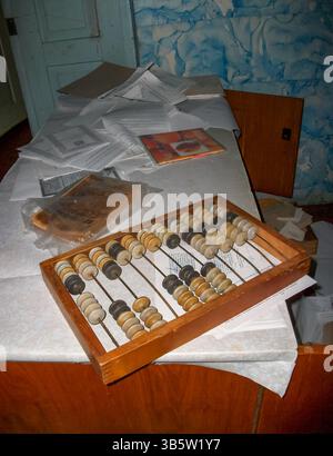 Wooden bills. Ancient counting tool on the table Stock Photo
