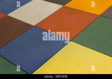 Tiles mats inside a play room, kindergarten school or gym, Industry Stock Photo