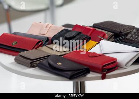 Genuine leather wallets on a store window, Sale Stock Photo